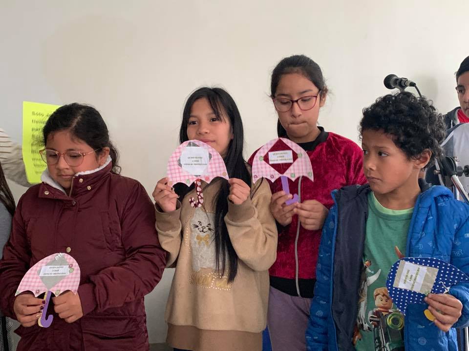 Children in Peru Sharing their Sunday School Crafts